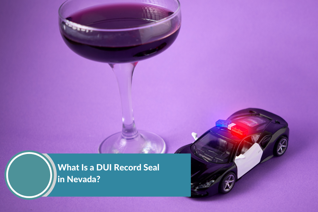 toy police car and glass of wine on a table - a concept of DUI